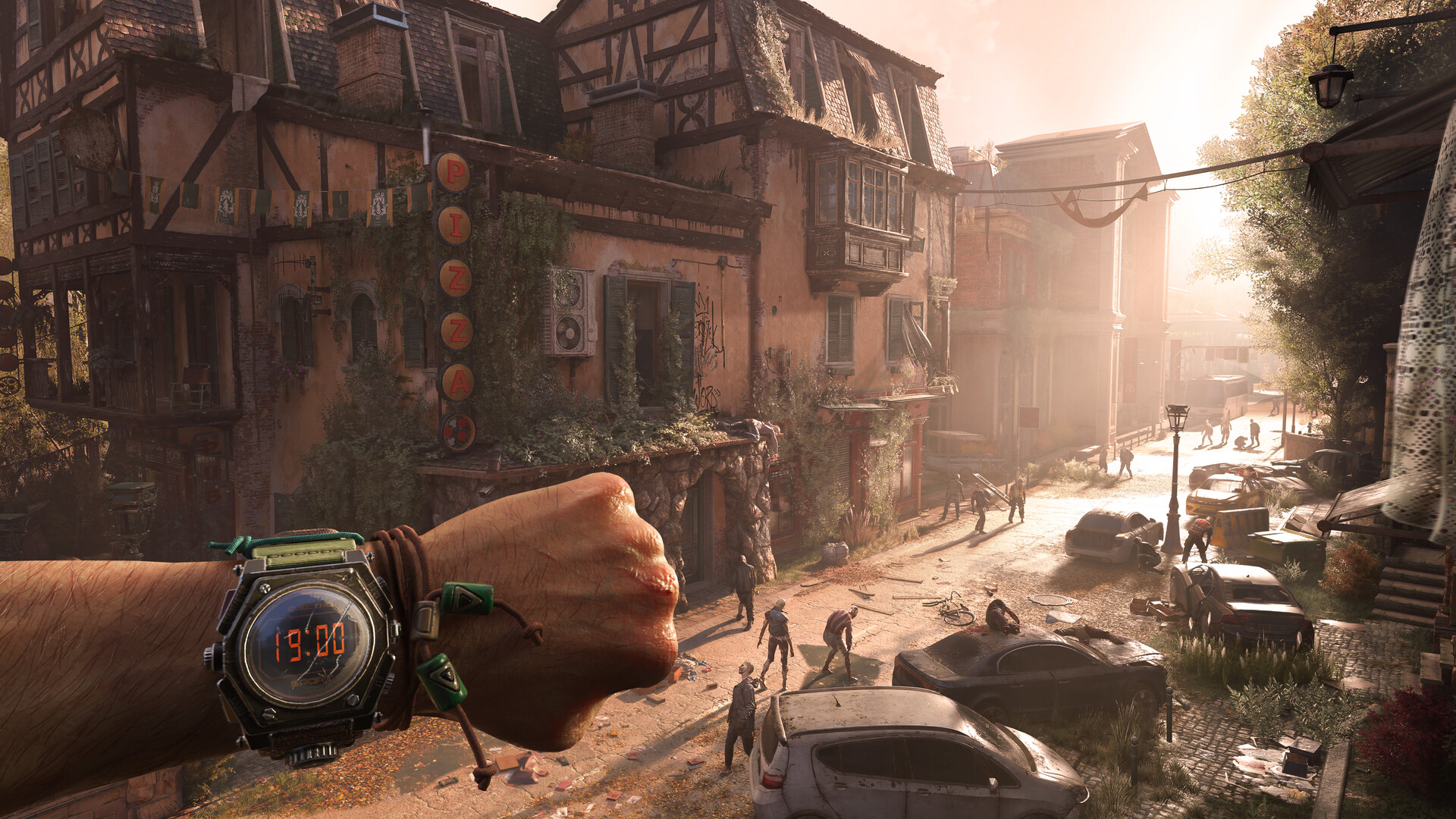 Dying Light: The Beast — A fist with a digital watch shows 19:00, overlooking a sunlit, post-apocalyptic European street with half-timbered buildings, abandoned cars, and zombie-like figures.