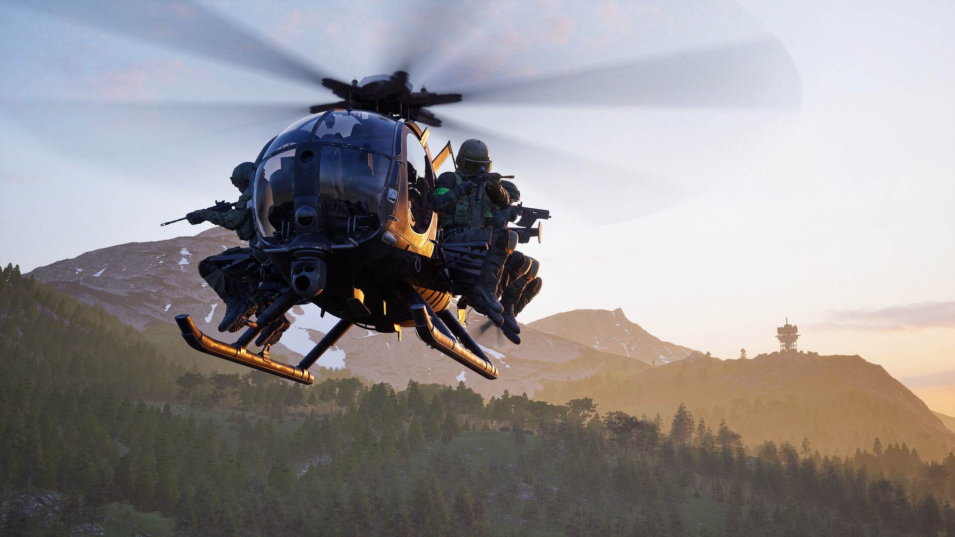 WARDOGS — Military helicopter carrying armed personnel flies over mountains and forests during sunrise.