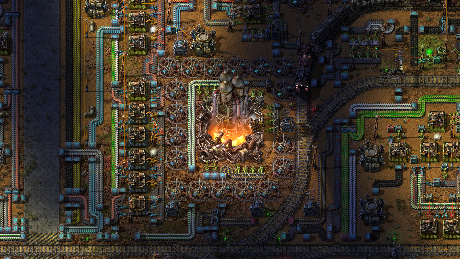 A factory with rail lines around its production area. Check that your own exit block fits the whole train.