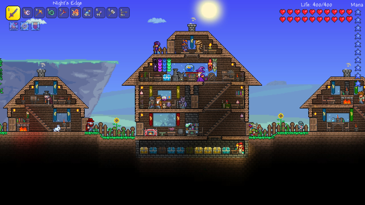 A Terraria settlement with several furnished rooms
