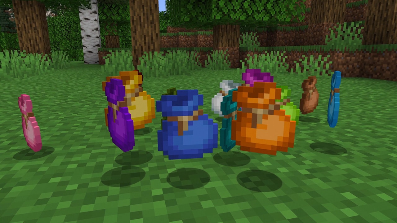 A group of differently colored bundles on grass in Minecraft